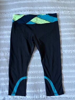 Lululemon Sz 12 Black Capri Leggings with Aqua and Lime Accent Waistband